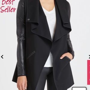 Spanx drape front jacket with faux leather sleeves.